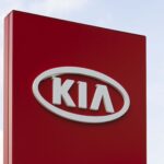 Dusseldorf, Germany - June 12, 2011: KIA logo at car dealer. KIA