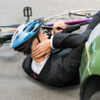 bigstock-Male-Cyclist-After-Car-Acciden-92492885-500×334